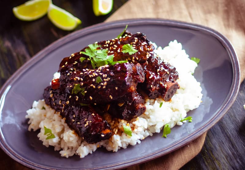 Pork riblets over rice